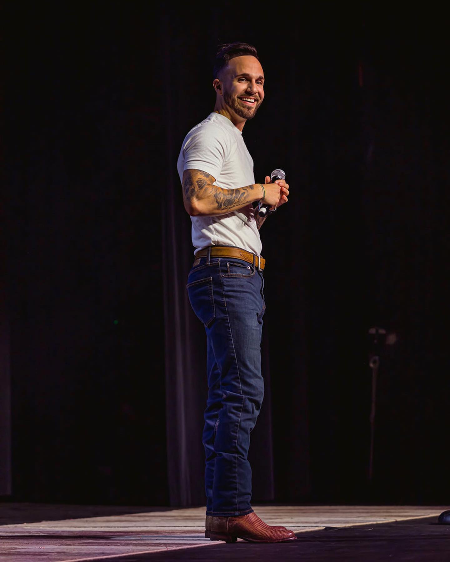 Cody performing on stage