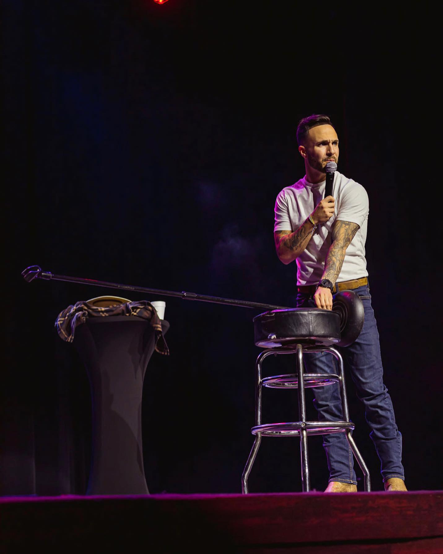 Cody with stool on stage